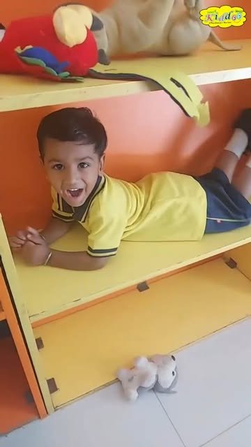 A child enjoying the classroom at Taxway Kiddoo