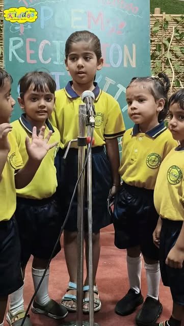 Taxway Kiddoo children taking part in a recitation activity